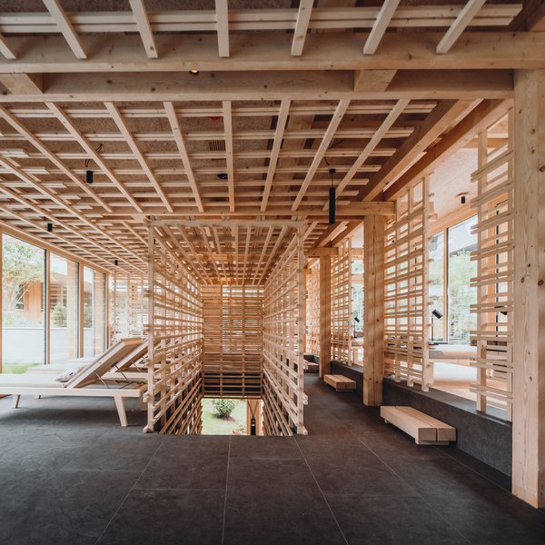 Sensoria Soulmates – Creating Memories of Bliss Bright room with wooden lattice ceiling and lounge chairs by large windows